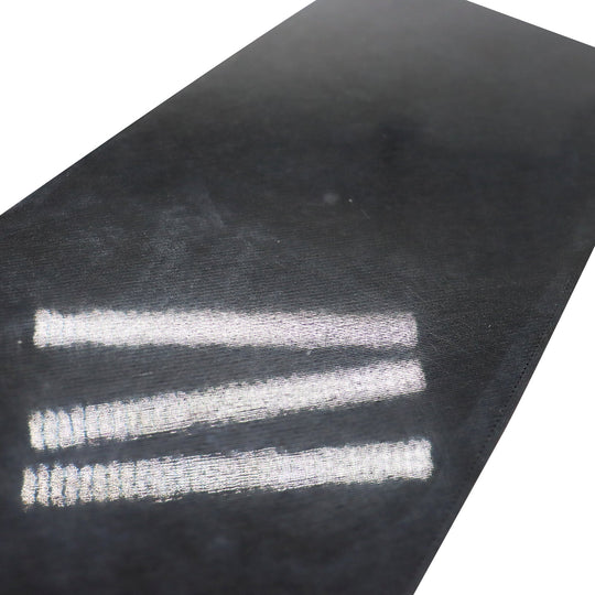 Close-up of QIDI X-Max 3 smooth plate, showing surface detail.