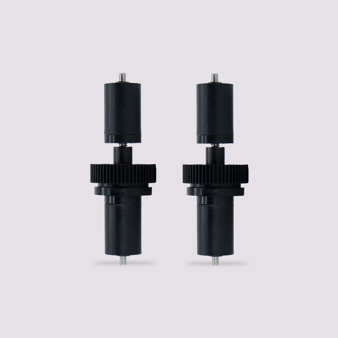 黒いギアと円筒形ボディを備えた2つのQIDI BOXアクティブサポートシャフトアセンブリ。